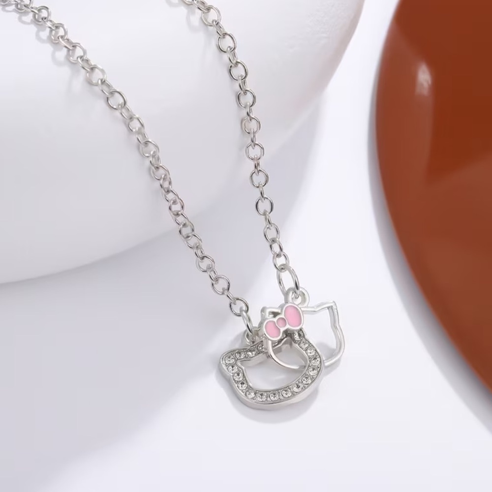 Silver and Pink Bow Necklace
